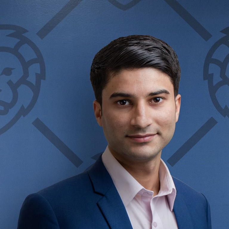 a-portrait-of-young-businessman-with-smartphone-A2GKEC4-768x768